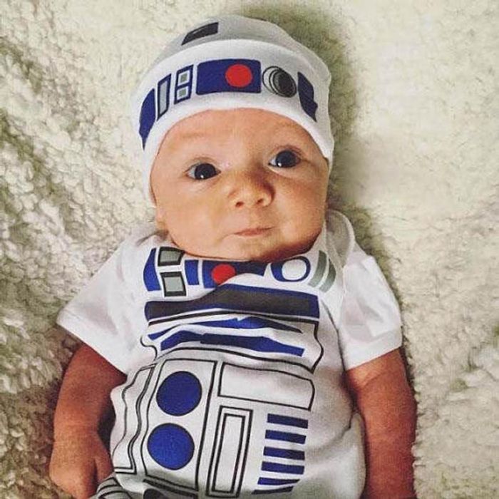 Baby wearing R2d2 onesie and hat