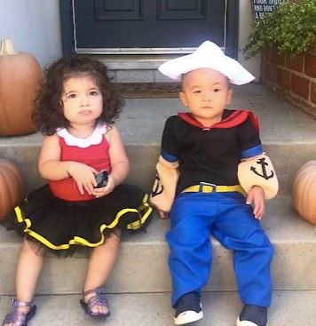 siblings dressed as popeye and olive oil