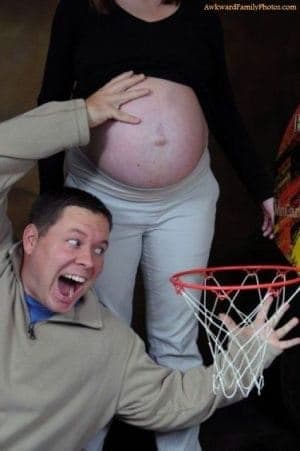 Man pretends to use pregnant woman's bare bump as a basketball